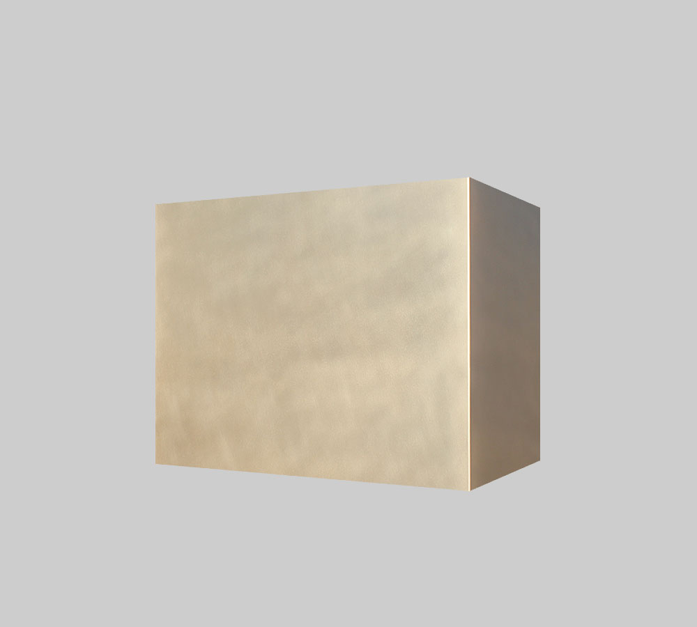 Modern box range hood in brass.